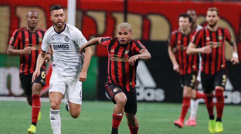 March 17, 2019 Atlanta: Atlanta United forward Josef Martinez breaks away from Philadelphia Union defender Haris Medunjanin to drive down the pitch during the first half in a MLS soccer match on Sunday, March 17, 2019, in Atlanta.   Curtis Compton/ccompton@ajc.com