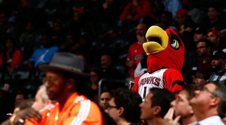 Hawks mascot Harry the Hawk often goes into the crowd at Philips Arena.