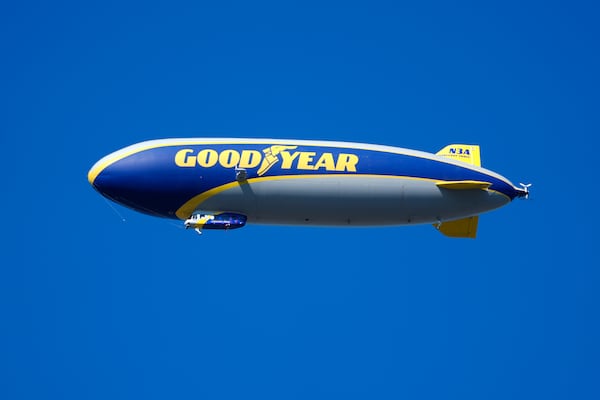 FILE - A Goodyear blimp flies over Michigan Stadium in the first half of an NCAA college football game between Michigan and Southern California in Ann Arbor, Mich., Saturday, Sept. 21, 2024. (AP Photo/Paul Sancya, File)