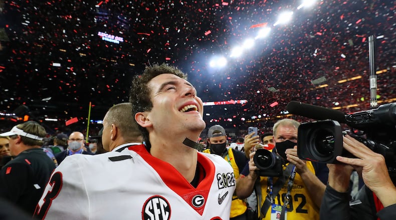Georgia quarterback Stetson Bennett relishes the moment, becoming emotional after defeating Alabama to win the College Football Playoff Championship game on Jan. 10 in Indianapolis. (Curtis Compton / Curtis.Compton@ajc.com)