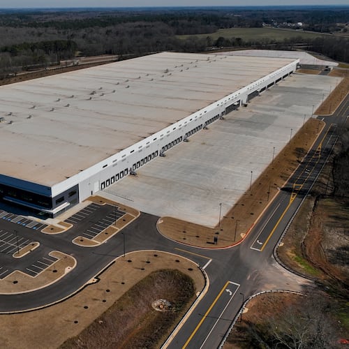 FILE - A newly built warehouse is seen on Friday, Feb. 6, 2026, in Social Circle, Ga., where officials are concerned about U.S. Immigrations and Customs Enforcement's plans connected to a $45-billion expansion of immigrant detention centers. (AP Photo/Mike Stewart, file)
