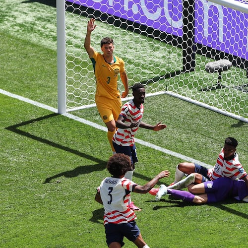 Australia's Aiden O'Neill (13) appeals for offside after United States' Alex Freeman (16) scored a goal past Australia goalkeeper Patrick Beach (18) during the World Cup Group D soccer match between the United States and Australia in Seattle, Friday, June 19, 2026. (AP Photo/Maddy Grassy)