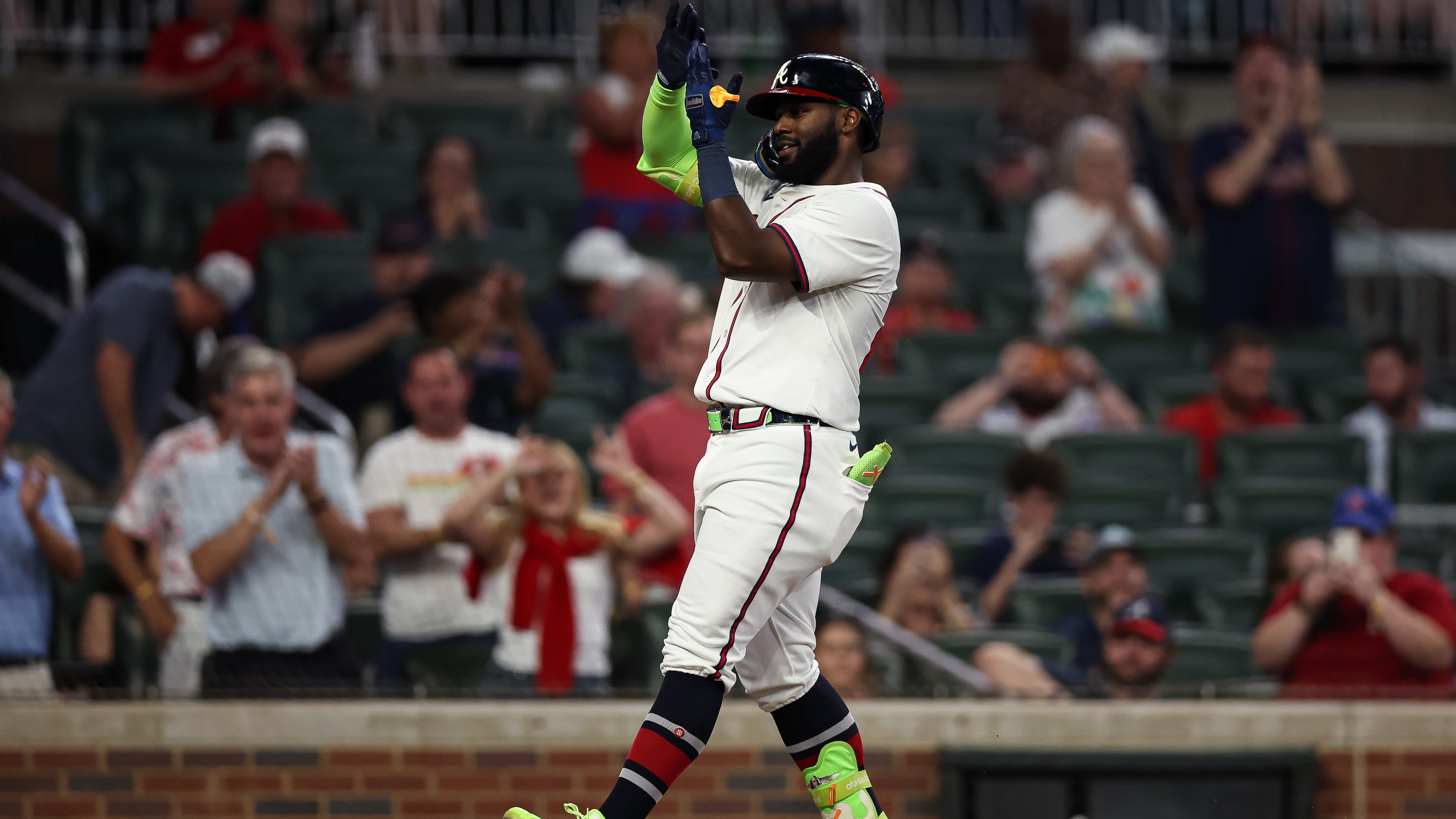 Atlanta Braves' Michael Harris II reacts after hitting a solo home run in the seventh inning of a baseball game against the Washington Nationals, Tuesday, Sept. 23, 2025, in Atlanta. (AP Photo/Colin Hubbard)