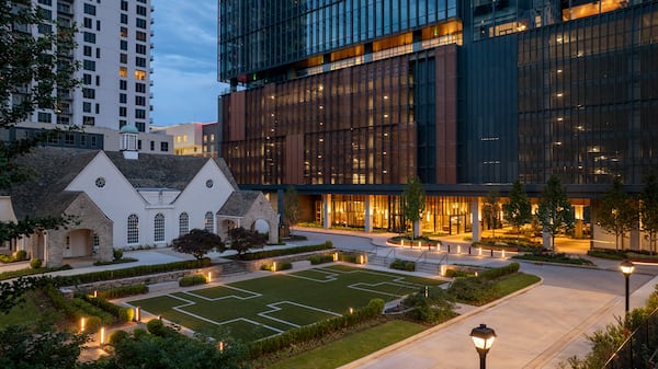 Drone shot of the exterior of a modern office building in midtown Atlanta