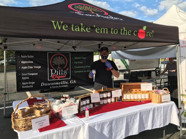 David Pitts mans the Pitts’ Original booth at the Alpharetta Farmers Market. Courtesy of Dana Pitts