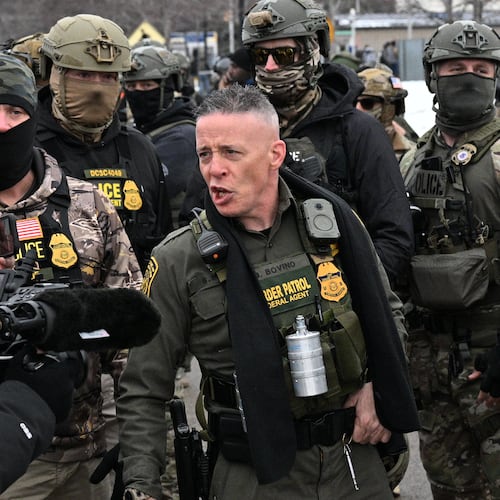 U.S. Border Patrol Cmdr. Gregory Bovino arrives as protesters gather outside the Bishop Henry Whipple Federal Building, Thursday, Jan. 8, 2026, in Minneapolis, Minn. (AP Photo/Tom Baker)