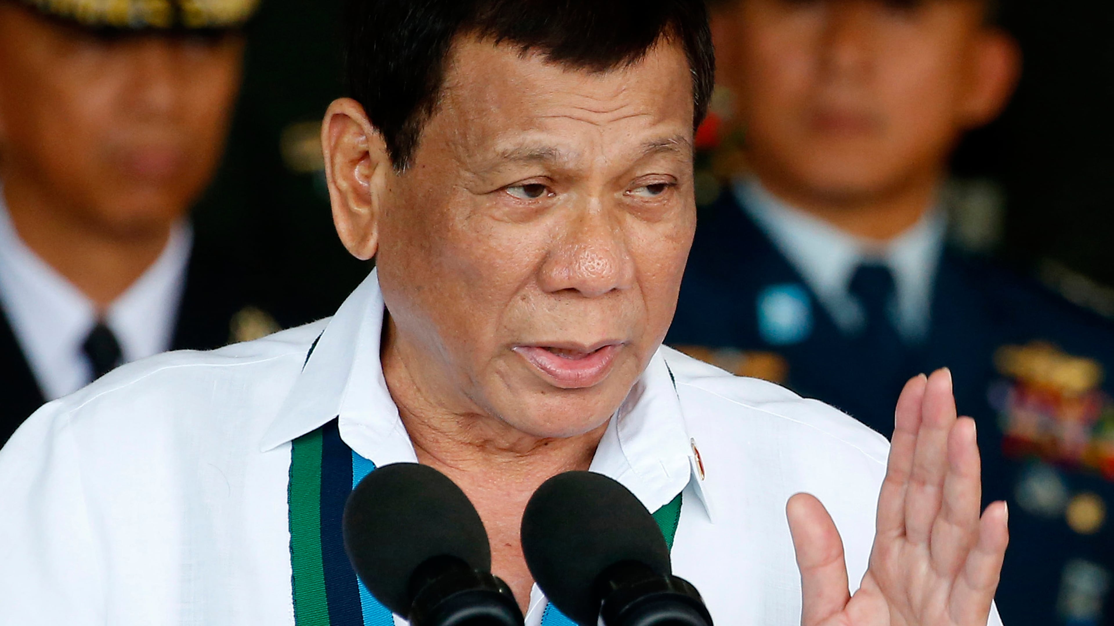 FILE - Philippine President Rodrigo Duterte addresses the troops during the 82nd anniversary celebration of the Armed Forces of the Philippines in suburban Quezon city northeast of Manila, Philippines on Dec. 20, 2017. (AP Photo/Bullit Marquez, File)