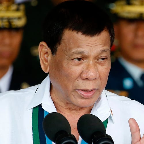 FILE - Philippine President Rodrigo Duterte addresses the troops during the 82nd anniversary celebration of the Armed Forces of the Philippines in suburban Quezon city northeast of Manila, Philippines on Dec. 20, 2017. (AP Photo/Bullit Marquez, File)