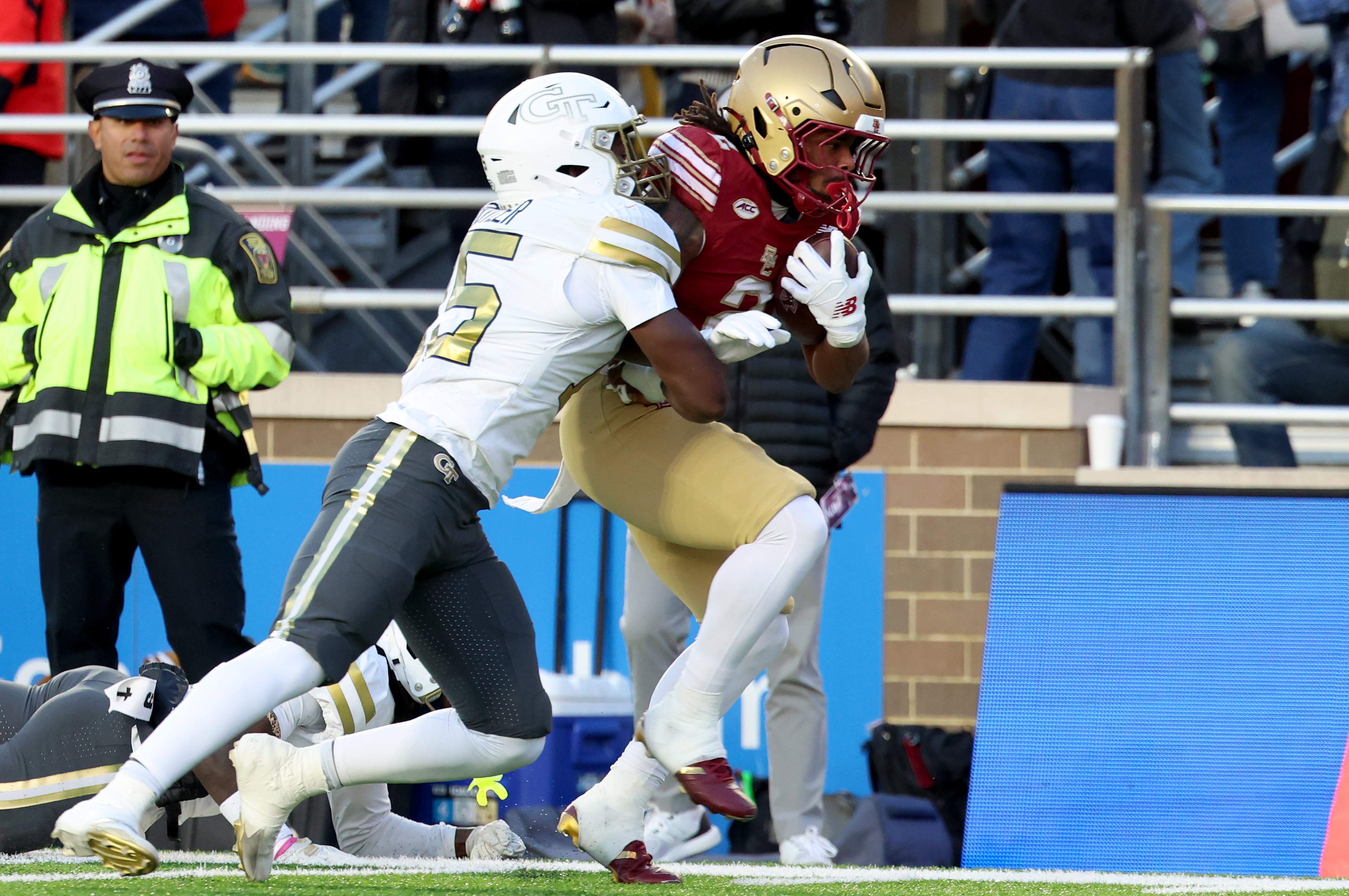 Georgia Tech linebacker Tah'J Butler, left, tackles Boston College running back Turbo Richard, right, during the first half of an NCAA college football game Saturday, Nov. 15, 2025, in Boston. (AP Photo/Mark Stockwell)