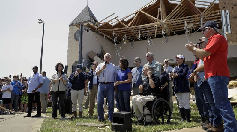 Vice President Mike Pence, with his wife, Karen, speaks to residents affected by Hurricane Harvey during a visit to the First Baptist Church in Rockport on Aug. 31. Nearly 894,000 people in Texas met last week’s deadline to register for federal disaster assistance, the Federal Emergency Management Agency says. (AP Photo/Eric Gay, File)