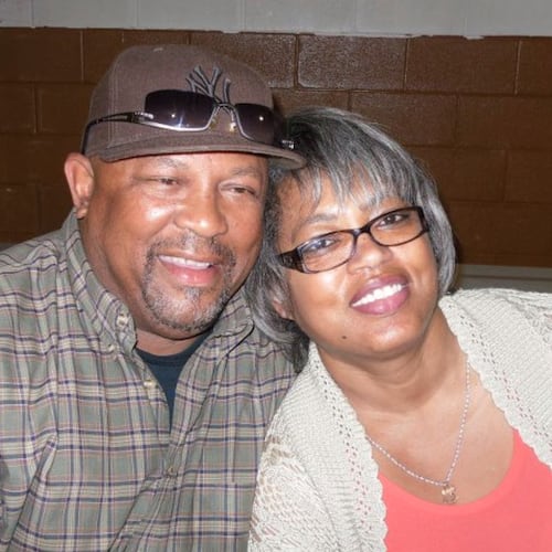 This August 2011 photo provided by Qureshi Law shows Erie Moore, Sr. with his sister, Catherine Moore, at his grandson's birthday in Bastrop, La. (Qureshi Law via AP)