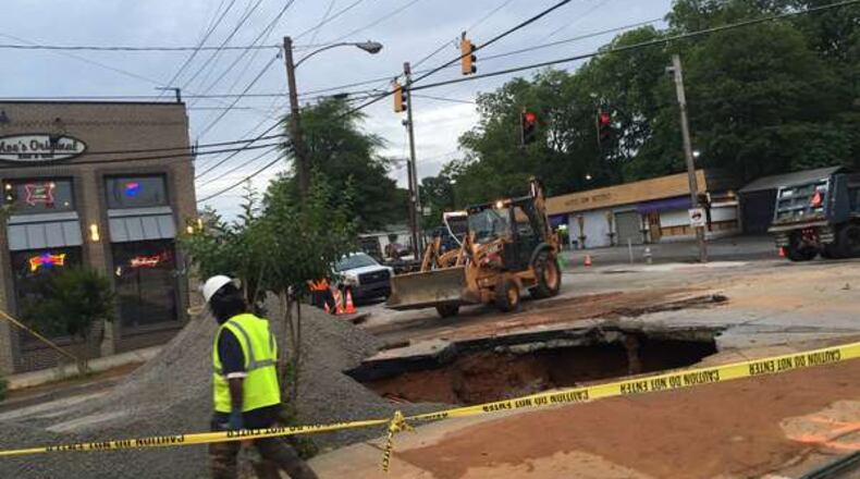 Officials expected the water main break to take between six and eight hours to repair, Atlanta Watershed officials said. JANAY KINGSBERRY/JANAY.KINGSBERRY@AJC.COM