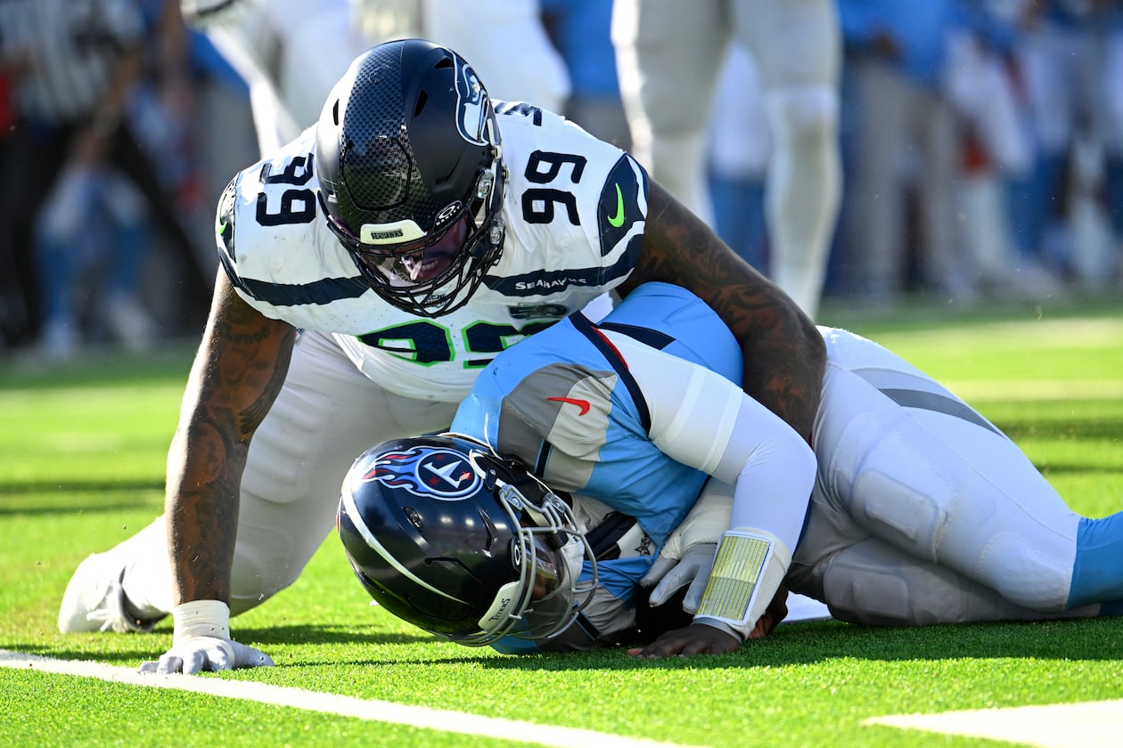 Seattle Seahawks defensive end Leonard Williams (99) sacks Tennessee Titans quarterback Cam Ward during the second half of an NFL football game Sunday, Nov. 23, 2025, in Nashville, Tenn. (John Amis/AP)