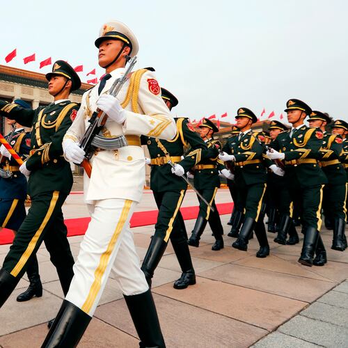 FILE - Members of an honor guard march as they prepare for a welcome ceremony for visiting U.S. President Donald Trump outside the Great Hall of the People in Beijing, Nov. 9, 2017. (AP Photo/Andy Wong, File)