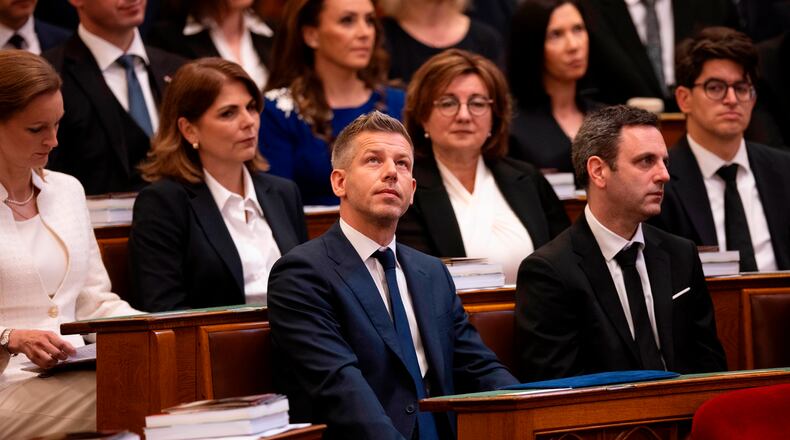Hungarian Prime Minister-elect Peter Magyar gestures before the inauguration ceremony at the Parliament in Budapest, Hungary, Saturday, May 9, 2026. (AP Photo/Denes Erdos)