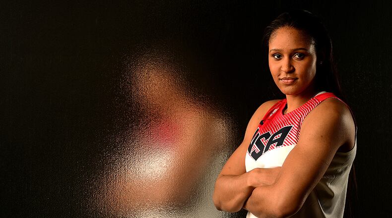 Maya Moore -- of Lawrenceville -- is one of few players to have earned an Olympic gold medal, a world championship gold, an NCAA title and a WNBA championship. The women's baseketball team begins its defense of its 2012 Gold on Sunday, Aug. 7. (Photo by Harry How/Getty Images)