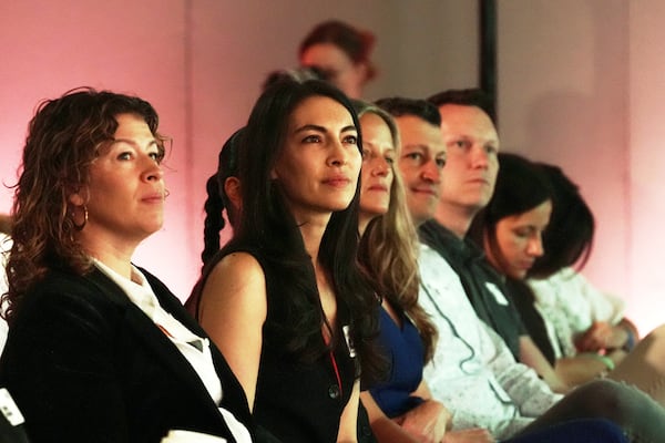 Attendees listen during the opening session of The Elevate Prize Foundation's Make Good Famous Summit, Tuesday, May 13, 2025, in Miami Beach, Fla. (AP Photo/Marta Lavandier)