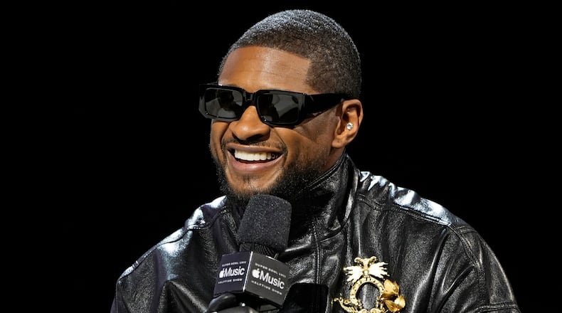 Usher speaks during a news conference ahead of the Super Bowl 58 NFL football game Thursday, Feb. 8, 2024, in Las Vegas. Usher will perform during the Super Bowl halftime show. (AP Photo/John Locher)