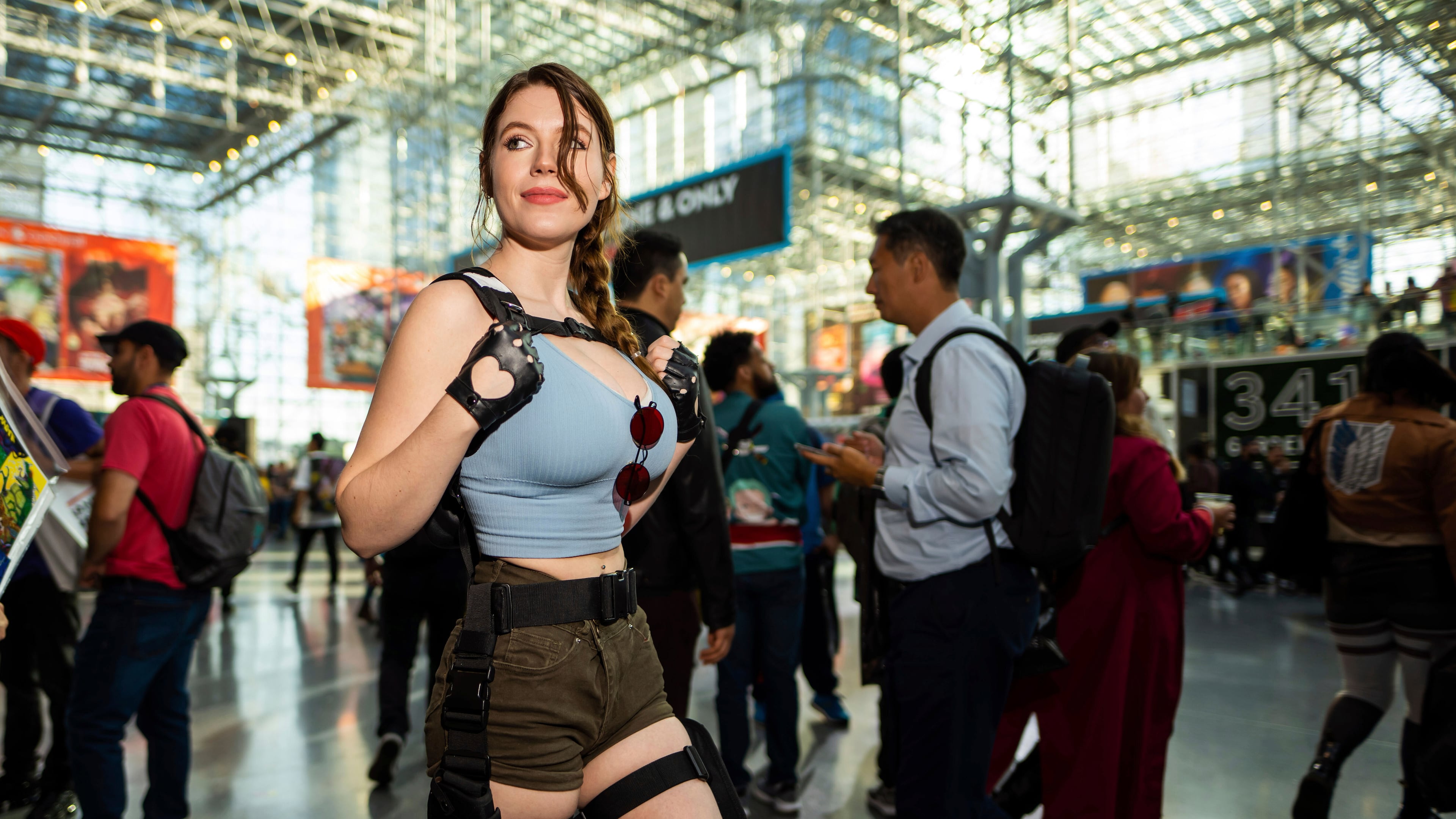 FILE - An attendee dressed as Lara Croft from Tomb Raider poses during New York Comic Con at the Jacob K. Javits Convention Center on Thursday, Oct. 12, 2023, in New York. (Charles Sykes/Invision/AP, File)