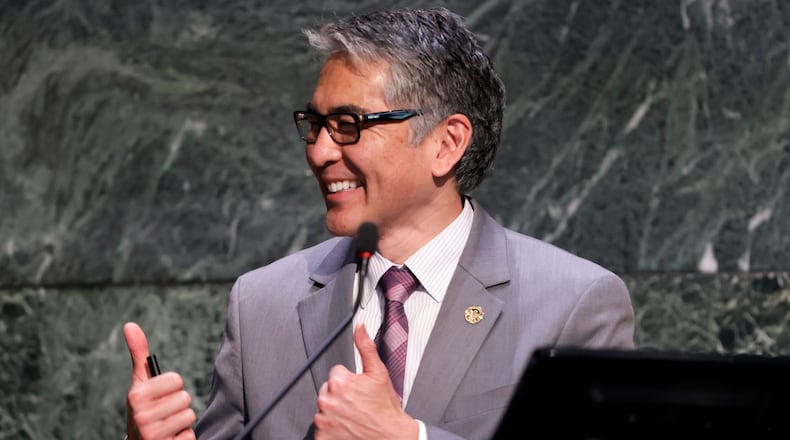 Council member Alex Wan reacts as he presents a committee report as the Atlanta City Council held their first in person meeting since they were suspended at start of the pandemic In Atlanta on Monday, March 21, 2022.   (Bob Andres / robert.andres@ajc.com)