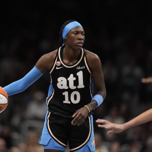 Dream guard Rhyne Howard (10) in the first half of an WNBA basketball game against the Sunday, Aug. 16, 2026, in Atlanta. (AP Photo/Brynn Anderson)