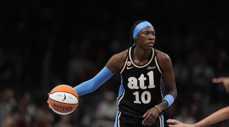 Dream guard Rhyne Howard (10) in the first half of an WNBA basketball game against the Sunday, Aug. 16, 2026, in Atlanta. (AP Photo/Brynn Anderson)