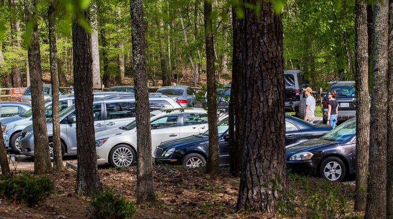 Hezli Holdings who owns property on Lakefield Drive plans to open a 13,000 square foot event center next door to the busy Six Bridges Brewing where parking spaces are taken quickly most weekends. Pictured is an image of the parking lot at Sweetwater Creek State Park. Jenni Girtman for The AJC
