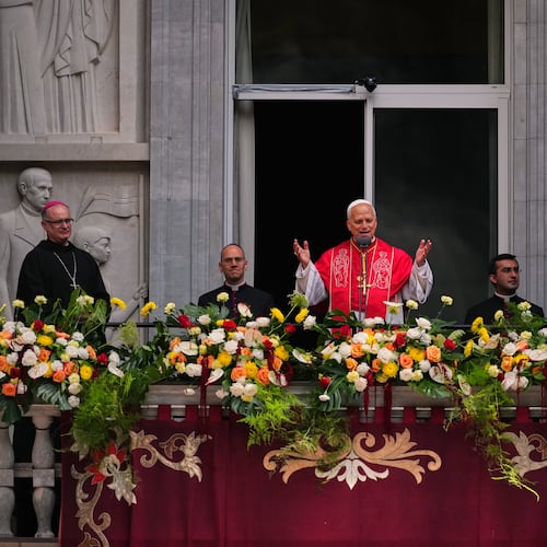 Pope Leo XIV greets the faithful from the balcony after leading a rosary at the Abbey of Our Lady of Montserrat, in Montserrat, Spain, Wednesday, June 10, 2026. (AP Photo/Joan Mateu Parra)