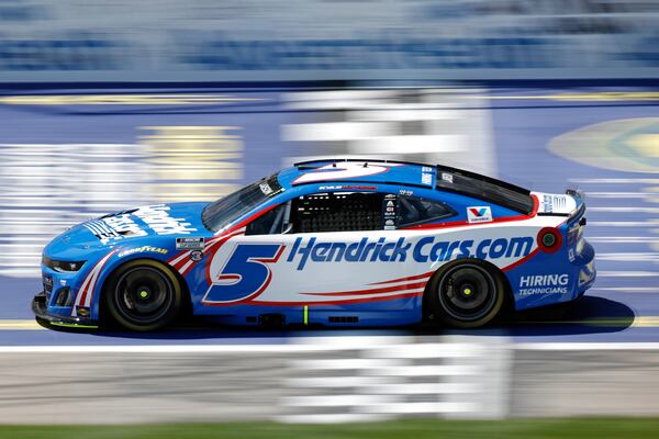 Kyle Larson crosses the start/finish line during the first stage of a NASCAR Cup Series auto race at Kansas Speedway in Kansas City, Kan., Sunday, May 11, 2025. (AP Photo/Colin E. Braley)