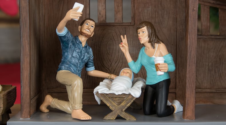 Mary and Joseph use social media to spread the word about the birth of baby Jesus. HANDOUT