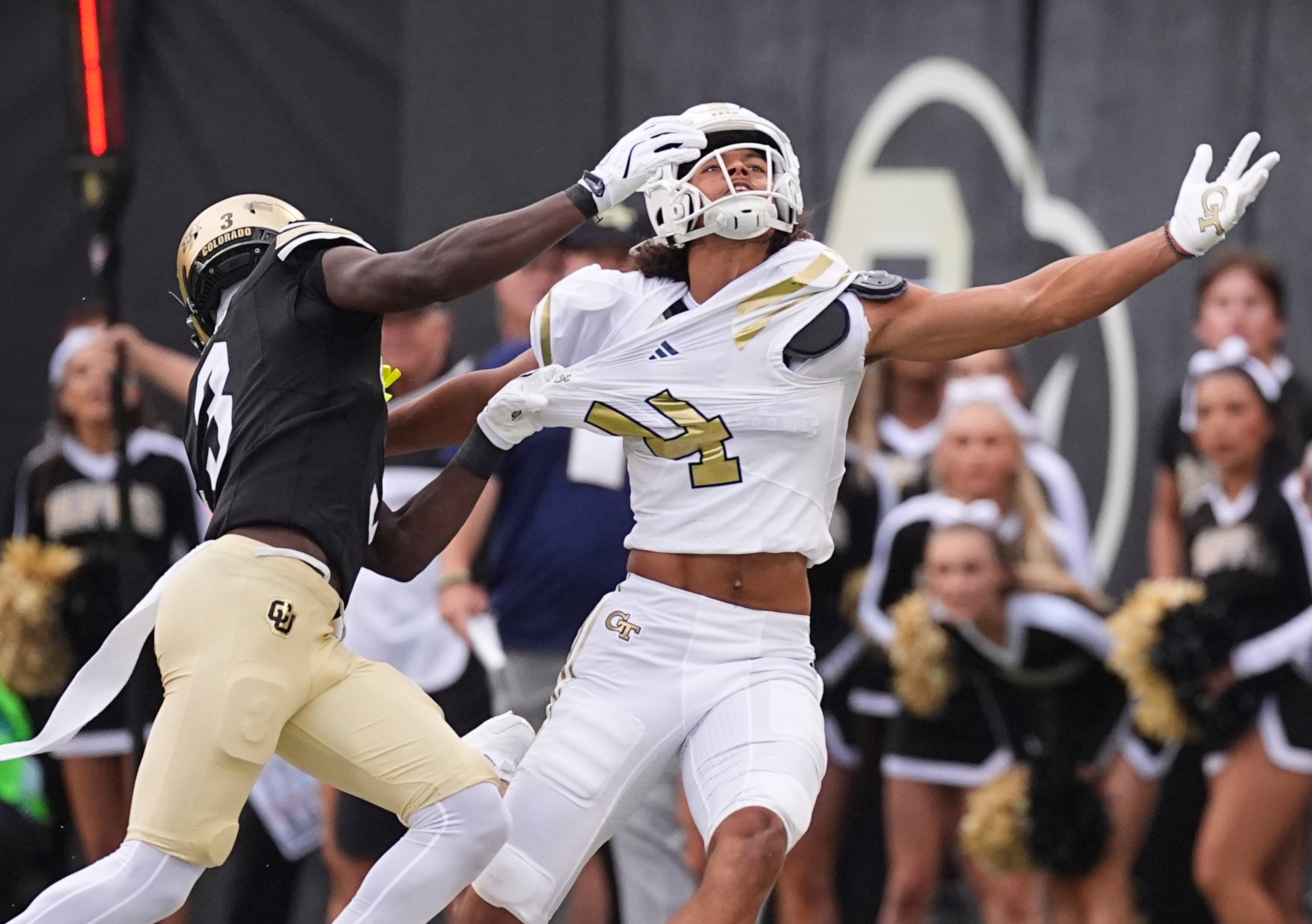 Colorado cornerback Teon Parks, left, is called for pass interference while covering Georgia Tech wide receiver Isiah Canion in the first half of an NCAA college football game Friday, Aug. 29, 2025, in Boulder, Colo. (AP Photo/David Zalubowski)