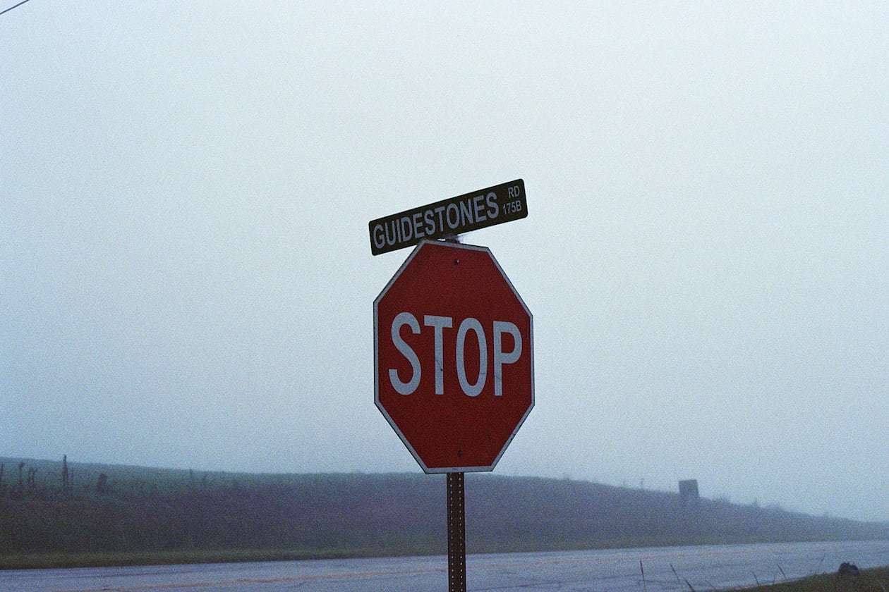 Thousands of people would turn on to Guidestones Road in Elberton every year to visit the Georgia Guidestones. But if you were to visit this place today, you'd be standing in an empty field. In 2022, someone blew them up. The AJC podcast "Who Blew Up the Guidestones?" explores the answer to that question and encounters some interesting people and places along the journey. (Tyler McBrien for the AJC)