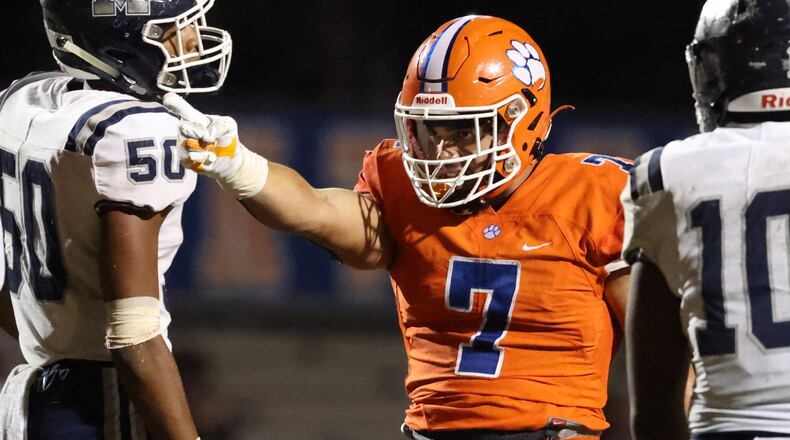 Cody Brown (7) reacts after a first down run in the second half.