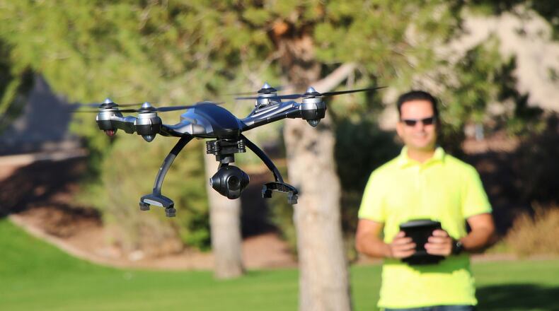 Camera drone flying at a park. (Dreamstime/TNS)