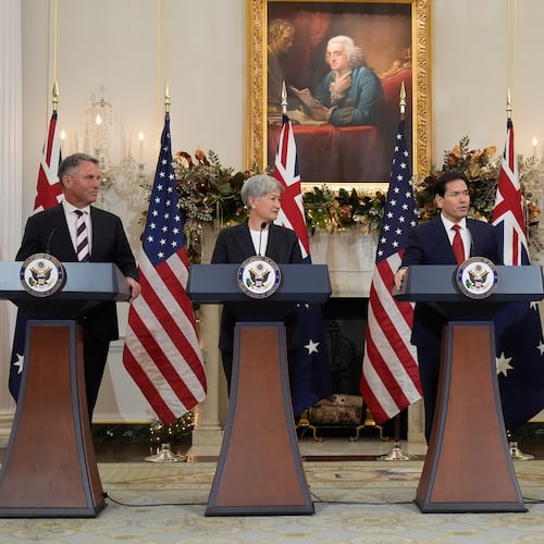 Secretary of State Marco Rubio speaks as Australia's Deputy Prime Minister and Defense Minister Richard Marles, Australia's Foreign Minister Penny Wong and Defense Secretary Pete Hegseth listen at the State Department, Monday, Dec. 8, 2025, in Washington. (AP Photo/Mark Schiefelbein)