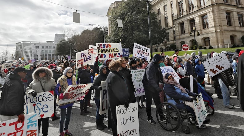 At least 500 gathered in near freezing temperatures on the anniversary of the U.S. Supreme Court’s decision on Roe v. Wade for Georgia’s annual March for Life anti-abortion rally. Bob Andres / bandres@ajc.com