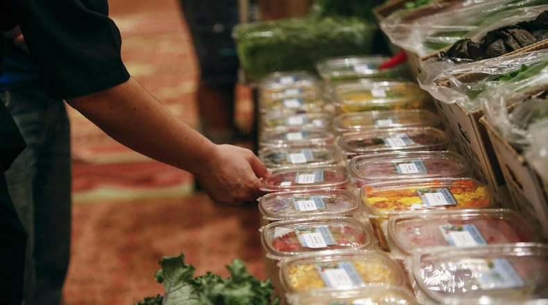 A view of the R. Pontano Produce’s display table at the Localecopia Meet & Greet at the Breakers, December 14, 2016 in Palm Beach. About 25 local businesses had their display tables at the Localecopia Meet & Greet. (Yuting Jiang / The Palm Beach Post)