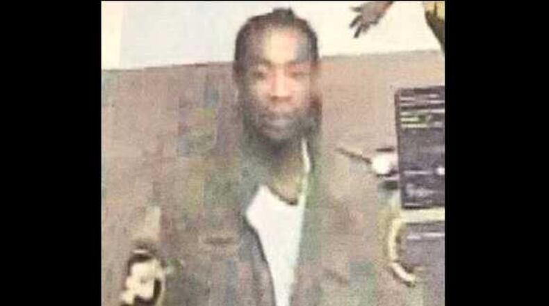 DeKalb County police need help identifying this man who is a suspect in the shooting of a Wal-Mart security guard in Lithonia.