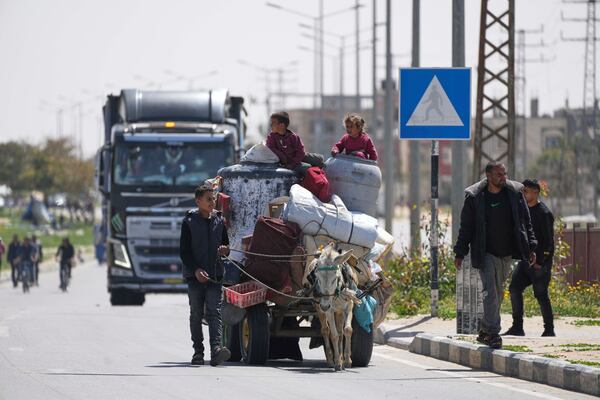 Displaced Palestinians, who flee from Rafah, arrive in Khan Younis, Gaza, on Monday, March 31, 2025, after the Israeli military issued sweeping evacuation orders covering most of Rafah. (AP Photo/Abdel Kareem Hana)