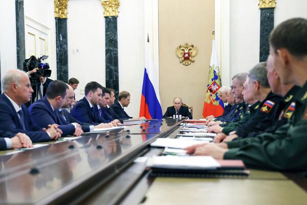 FILE - Russian President Vladimir Putin, center, chairs a meeting on a state arms program in Moscow, on Thursday, June 12, 2025. (Vyacheslav Prokofyev, Sputnik, Kremlin Pool Photo via AP)