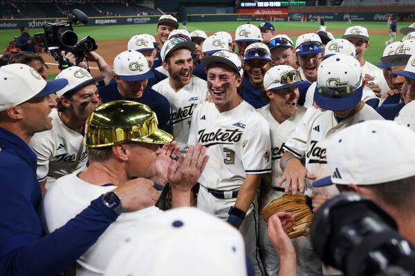 Georgia Tech baseball celebrates its April win over Georgia at Truist Park. (Jason Getz/AJC)