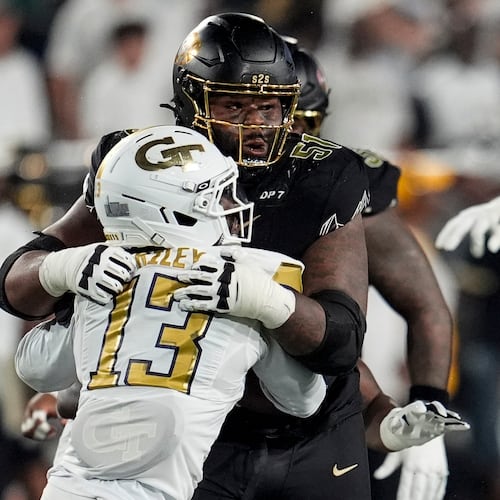 Colorado offensive lineman Chauncey Gooden (51) blocks Georgia Tech safety Savion Riley (13) during the first half of an NCAA college football game, Thursday, Sept. 3, 2026, in Atlanta. (AP Photo/Mike Stewart)