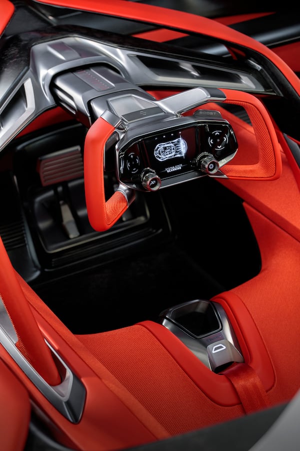 The CX features an F1-style steering yoke with a central digital display. (Courtesy of Chevrolet)