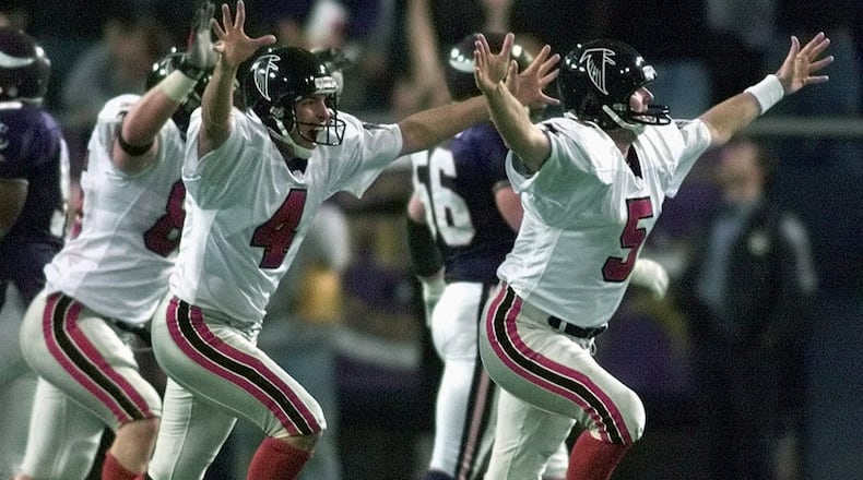 Falcons kicker Morten Andersen, right, and holder Dan Stryzinski (4) celebrate after Andersen's game-winning 38-yard field goal beat the Minnesota Vikings 30-27 in overtime for the NFC championship at the Metrodome in Minneapolis Sunday, Jan. 17, 1999. File photo