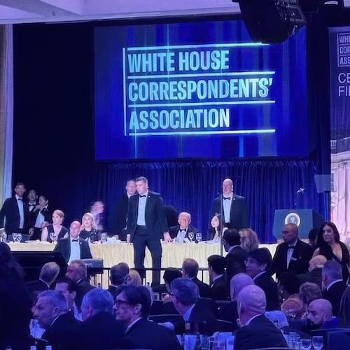 U.S. Secret Service agents surround President Donald Trump as he is taken from the stage after a shooting incident outside the ballroom during the White House Correspondents Dinner, Saturday, April 25, 2026, in Washington. (Alex Brandon/AP)