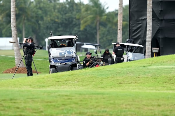 U.S. Secret Service Counter Snipers provide overwatch at Trump National Doral during the LIV Golf Miami tournament, Thursday, April 3, 2025, in Miami, where President Donald Trump will be attending evening events. (AP Photo/Alex Brandon)
