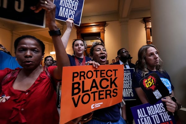 Demonstrators react as lawmakers discuss redistricting on Wednesday. (Mike Stewart/AP)