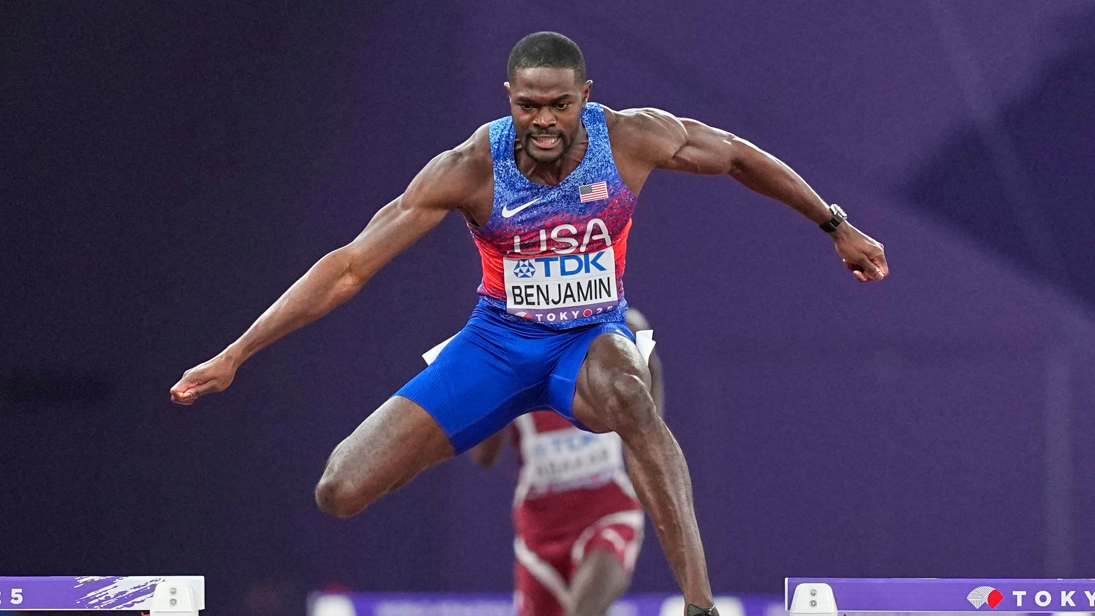 United States' Rai Benjamin hits the final hurdle but still wins the gold medal in the men's 400 meters hurdles final at the World Athletics Championships in Tokyo, Friday, Sept. 19, 2025. (AP Photo/Petr David Josek)