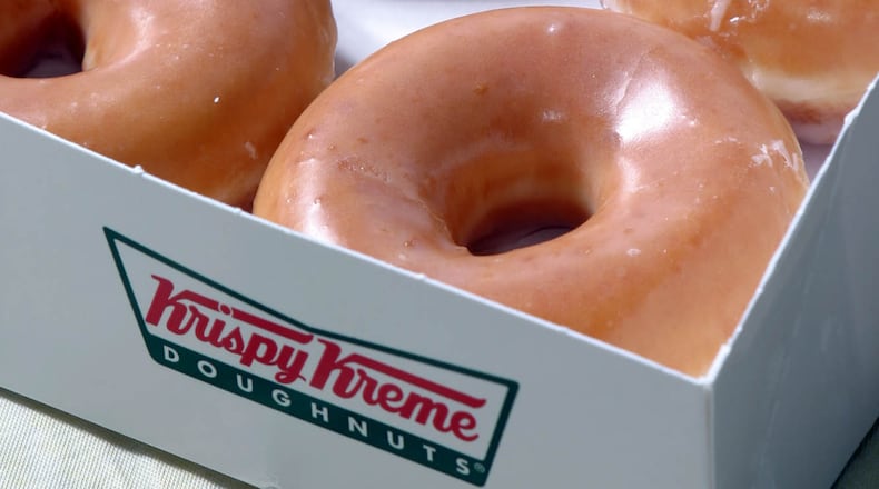Krispy Kreme glazed dougnuts are shown, Wednesday, Nov. 10, 2004, in Charlotte, N.C. Shares of Krispy Kreme Doughnuts Inc.'s fell sharply Monday as a 79 percent plunge in third quarter earnings and an intensifying accounting investigation overshadowed the pastry maker's statement that the low-carb craze might be easing. (AP Photo/Nell Redmond)