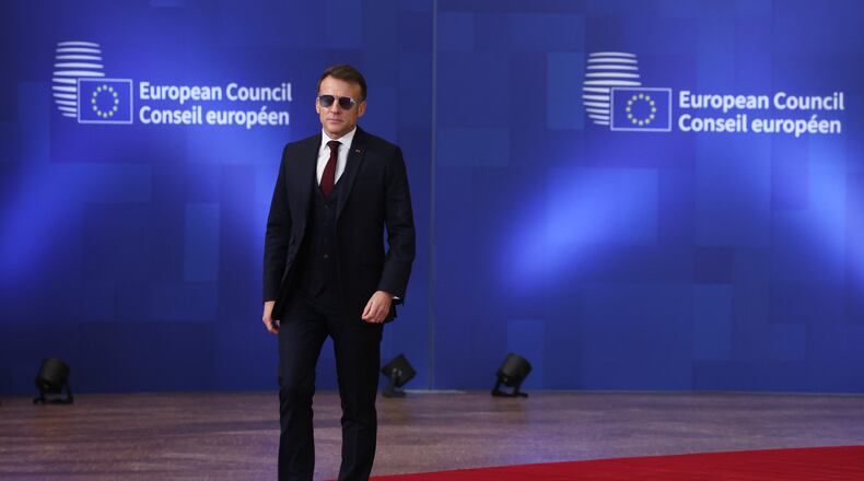 French President Emmanuel Macron arrives for the EU summit in Brussels, Thursday, Jan. 22, 2026. (AP Photo/Omar Havana)